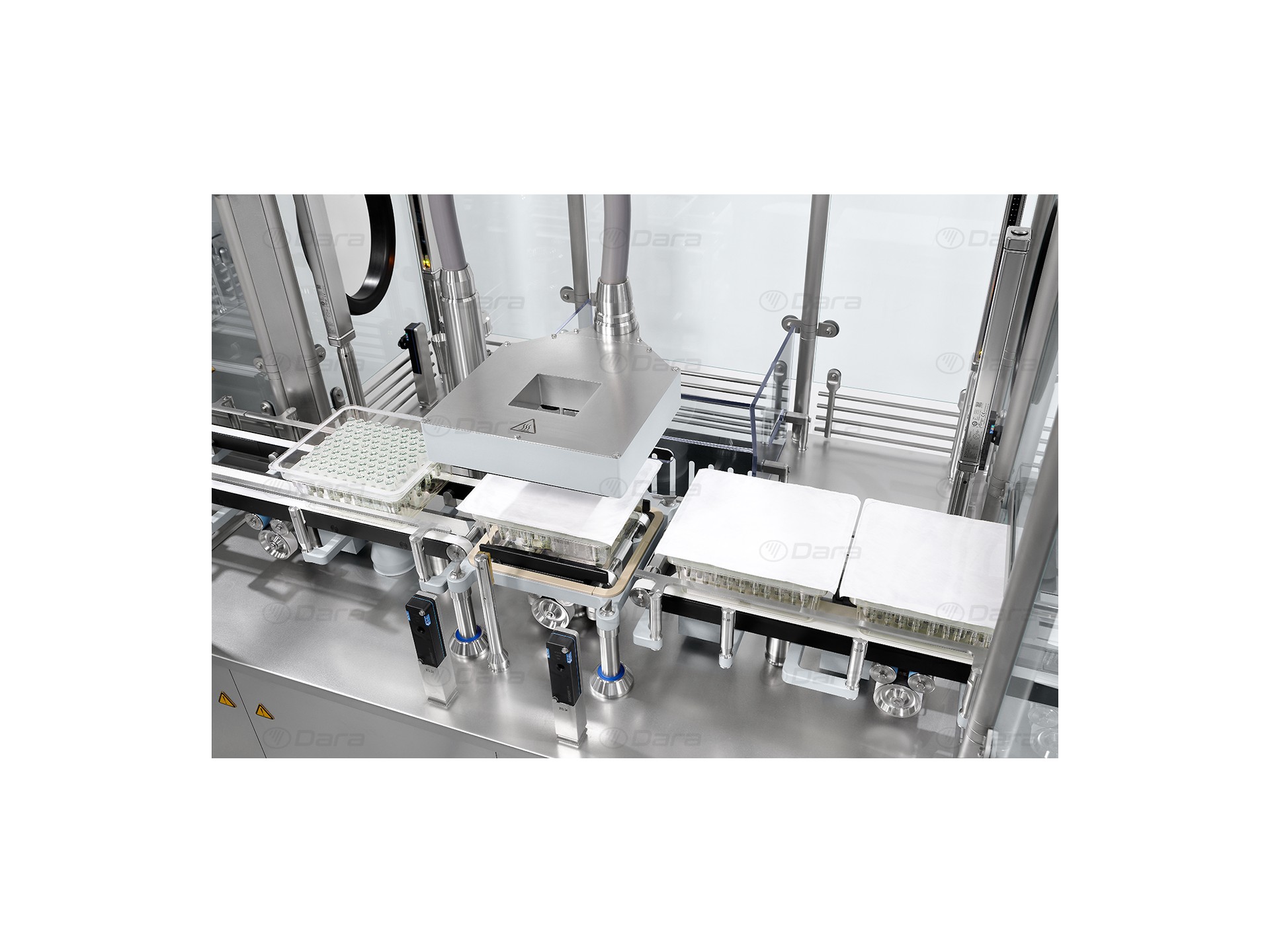 Nest Loading Machine NFL Filling closing machines for vials, syringes, and cartridges Nest