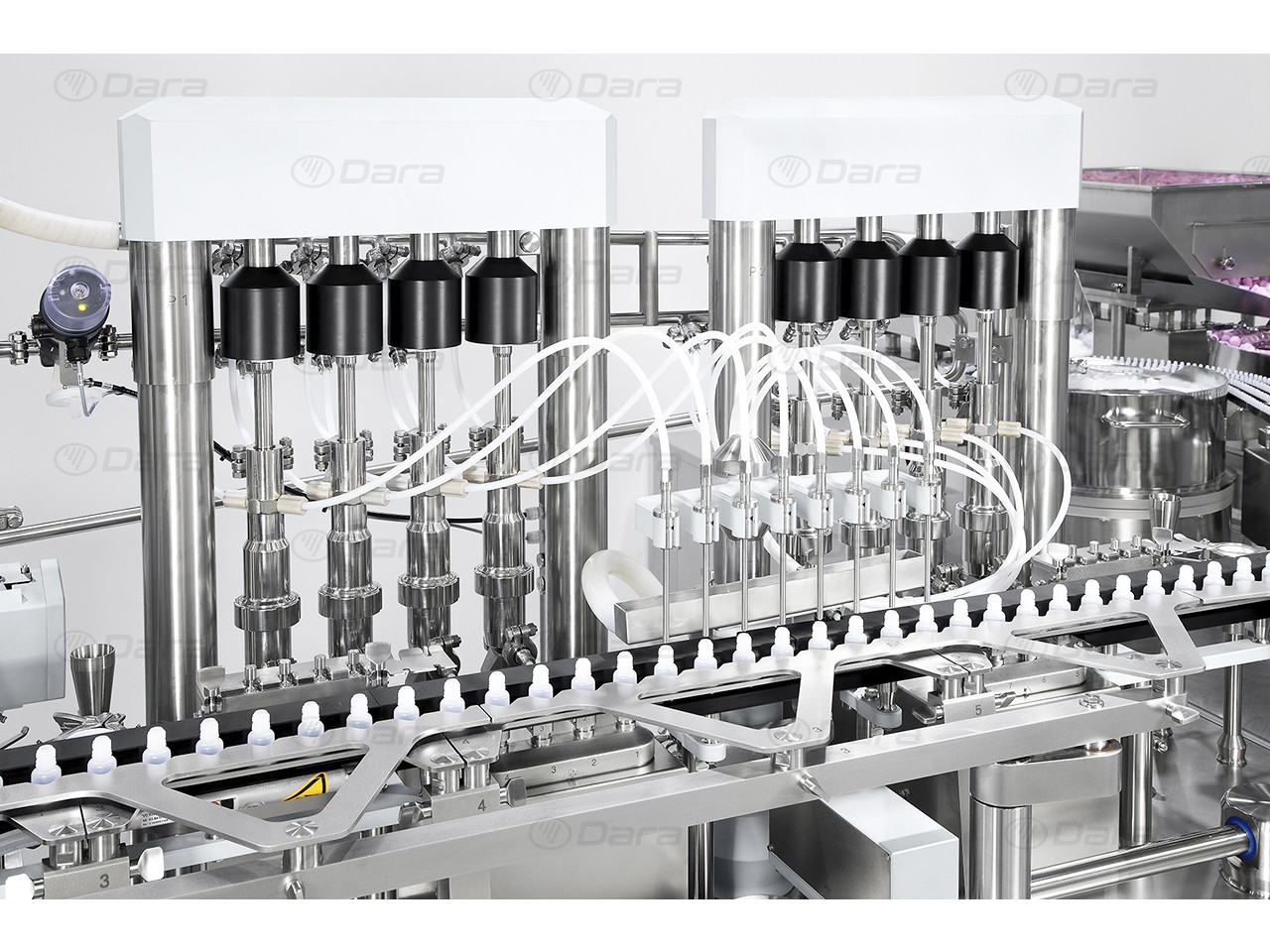 High speed filling and seaming machines for ophthalmic and nasal treatments