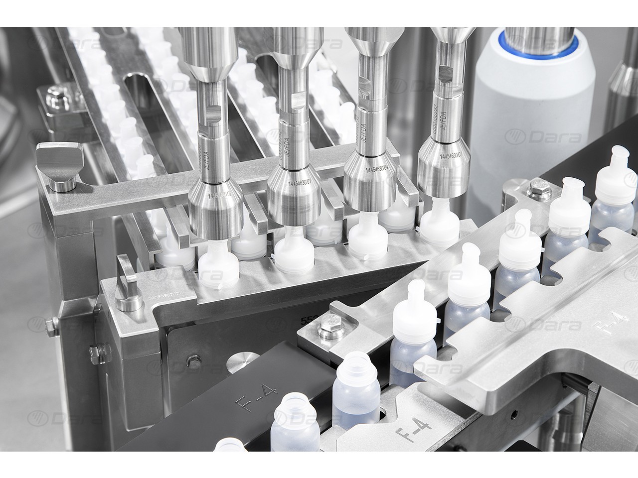 High speed filling and seaming machines for ophthalmic and nasal treatments