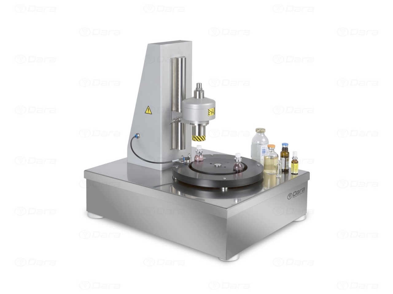 Tabletop machines for the automatic closing of vials and bottles